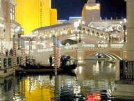 Bridges over water with buildings in the background