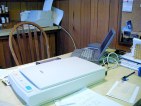 Stuff on a table with chair showing