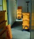 Moving crates in the hallway
