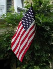 US Flag on another porch upright