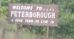 Road sign: Welcome to.... Peterborough, A good town to live in
