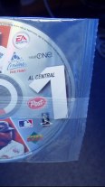 CD-ROM in plastic bag with logos of EA AOL Post MLB, etc.
