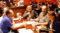 People around a table in a restaurant